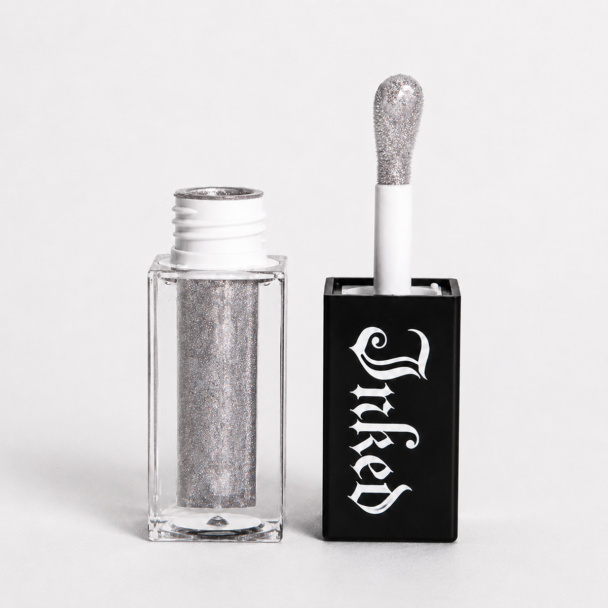 INKED Cosmetics: New School Stardust Lip Oil